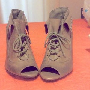 Wedged heel ankle boots with peep toe